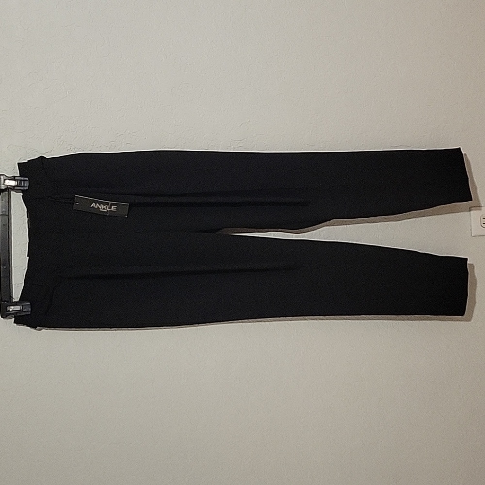 Express never worn, black ankle pants. High rise, 2 regular with 28 inch inseam.